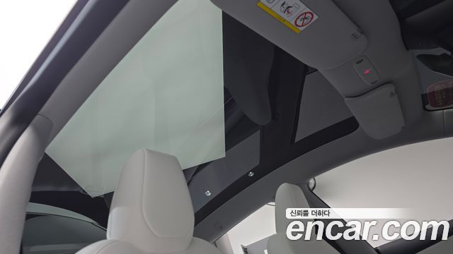 Tesla Model Y 2025 — photo 25
