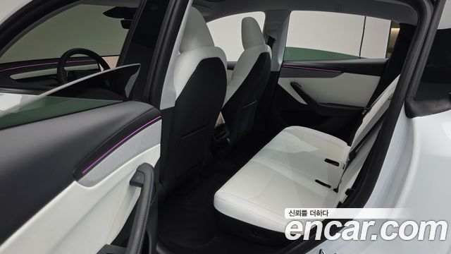 Tesla Model Y 2025 — photo 16