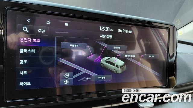 Kia Canival 2023 — photo 32
