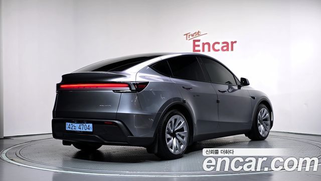 Tesla Model Y 2025 — photo 2