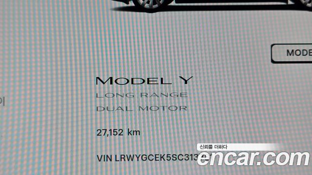 Tesla Model Y 2025 — photo 11