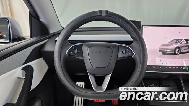 Tesla Model Y 2025 — photo 18