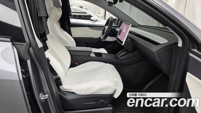 Tesla Model Y 2025 — photo 16