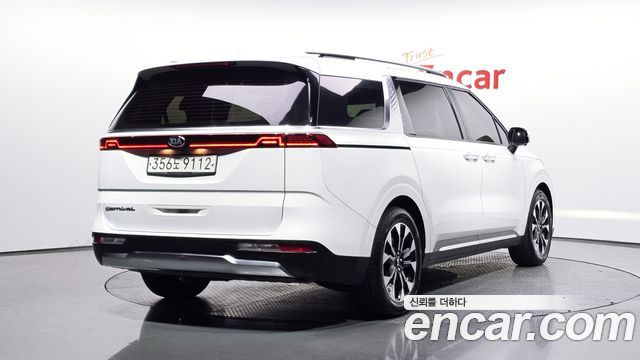 Kia Canival 2021 — photo 2