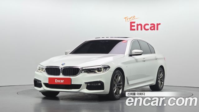 BMW 5-Series 2018 — photo 1