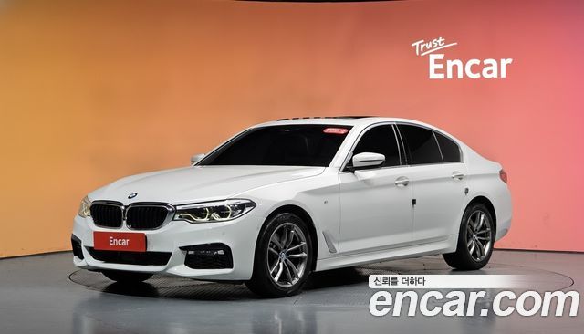 BMW 5-Series 2018 — photo 1