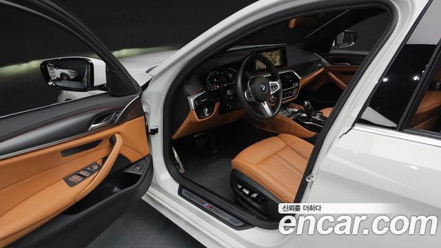 BMW 5-Series 2023 — photo 13