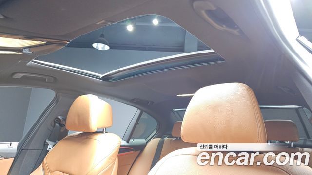 BMW 5-Series 2023 — photo 22