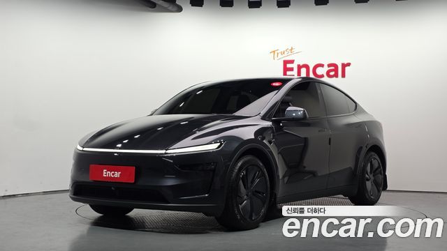 Tesla Model Y 2025 — photo 1