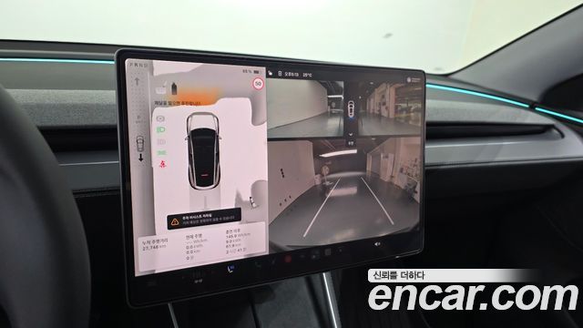 Tesla Model Y 2025 — photo 14