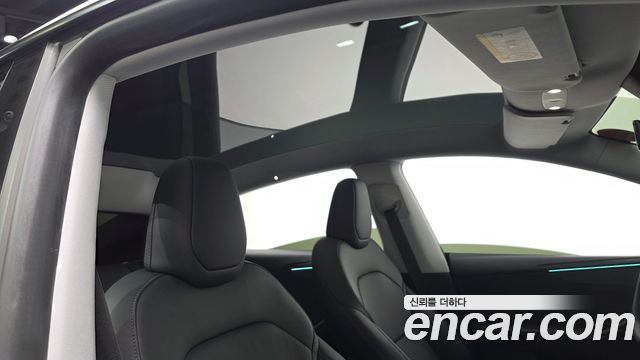 Tesla Model Y 2025 — photo 18
