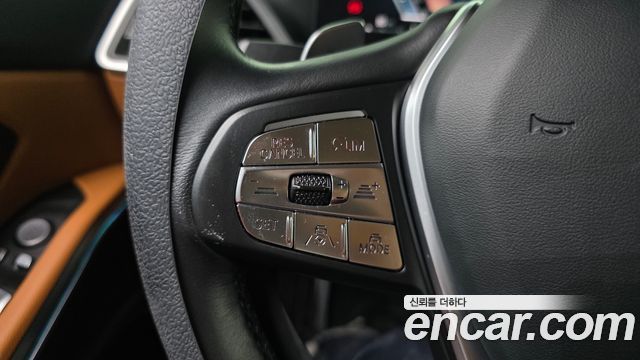 BMW 3-Series 2023 — photo 32