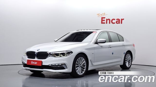 BMW 5-Series 2018 — photo 1
