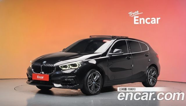 BMW 1-Series 2023 — photo 1
