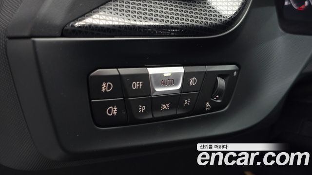 BMW 1-Series 2023 — photo 31