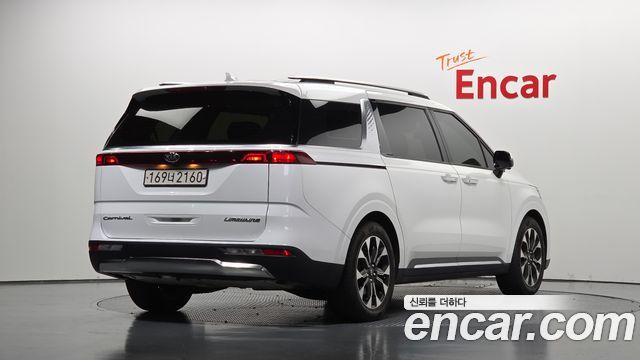 Kia Canival 2021 — photo 2