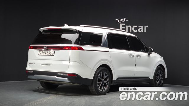 Kia Canival 2021 — photo 2
