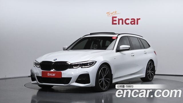 BMW 3-Series 2021 — photo 1