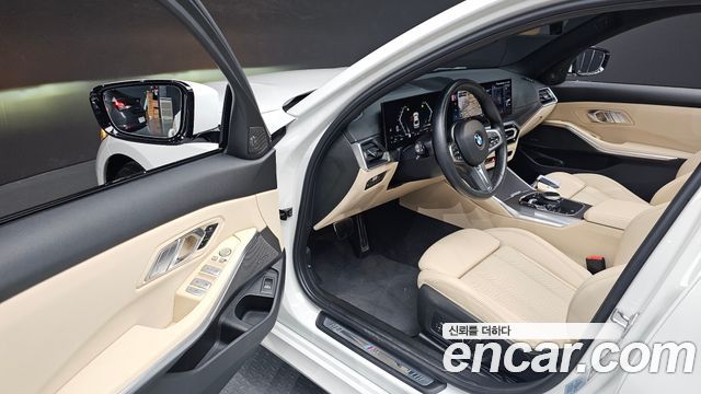 BMW 3-Series 2024 — photo 13
