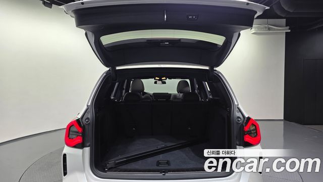 BMW iX3 2023 — photo 20