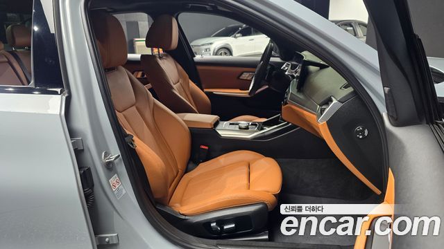 BMW 3-Series 2023 — photo 13