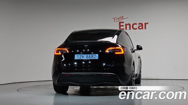 Tesla Model Y 2025 — photo 4
