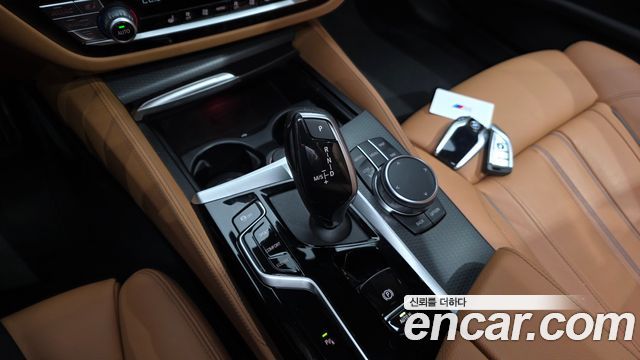 BMW 5-Series 2023 — photo 12