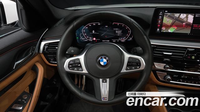 BMW 5-Series 2023 — photo 19