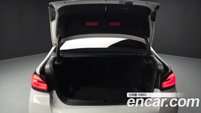 BMW 5-Series 2023 — photo 26