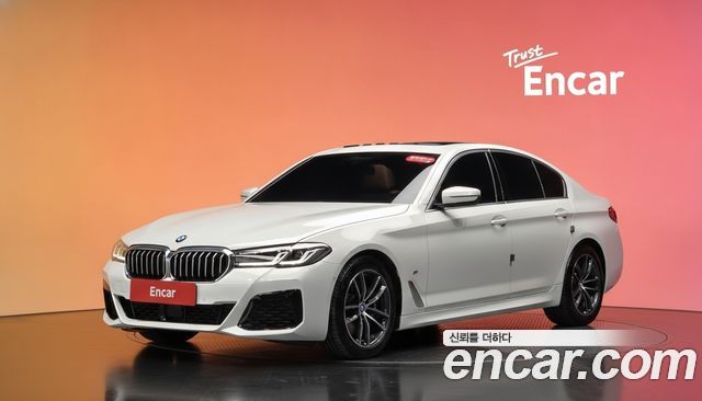 BMW 5-Series 2023 — photo 1