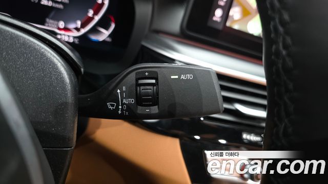 BMW 5-Series 2023 — photo 30