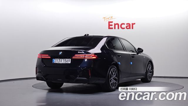 BMW 5-Series 2024 — photo 2
