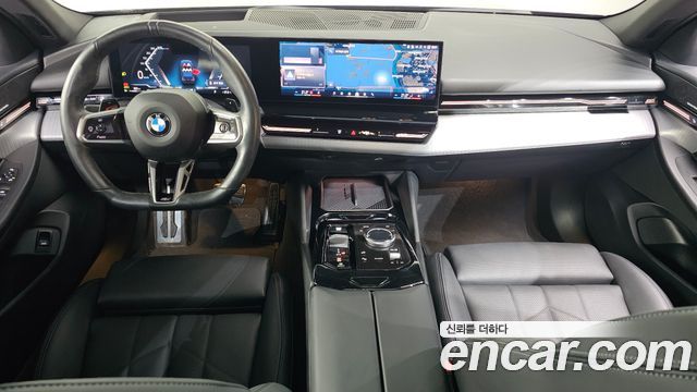 BMW 5-Series 2024 — photo 10