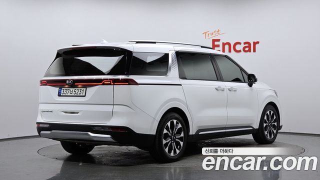 Kia Canival 2021 — photo 2