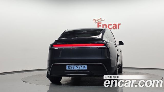 Tesla Model Y 2025 — photo 4