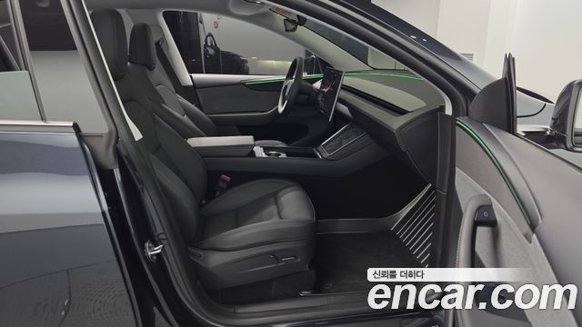 Tesla Model Y 2025 — photo 17