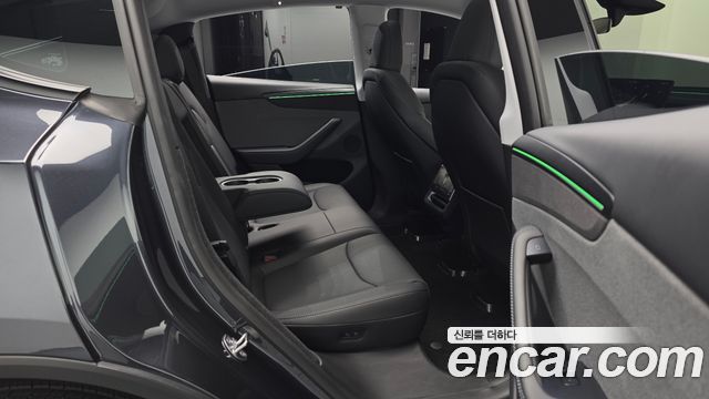 Tesla Model Y 2025 — photo 18