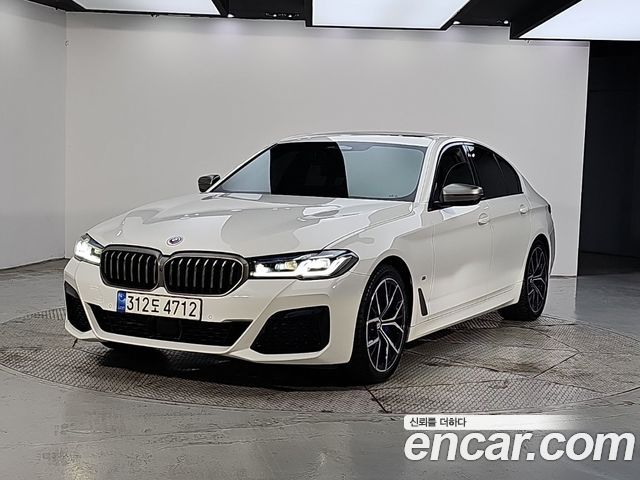 BMW 5-Series 2022 — photo 1