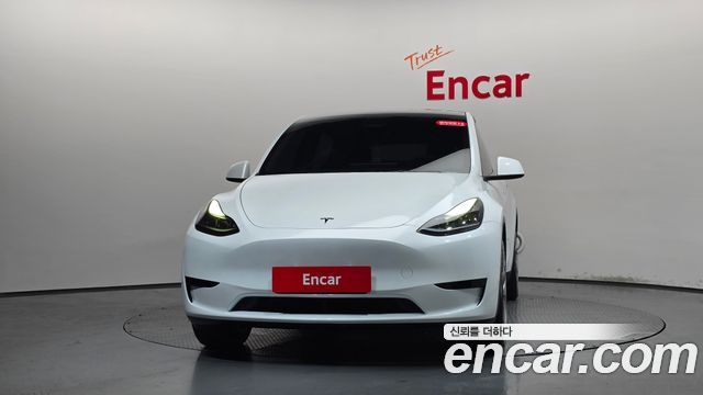 Tesla Model Y 2024 — photo 3