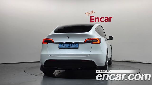 Tesla Model Y 2024 — photo 4