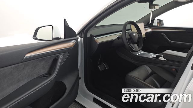 Tesla Model Y 2024 — photo 13