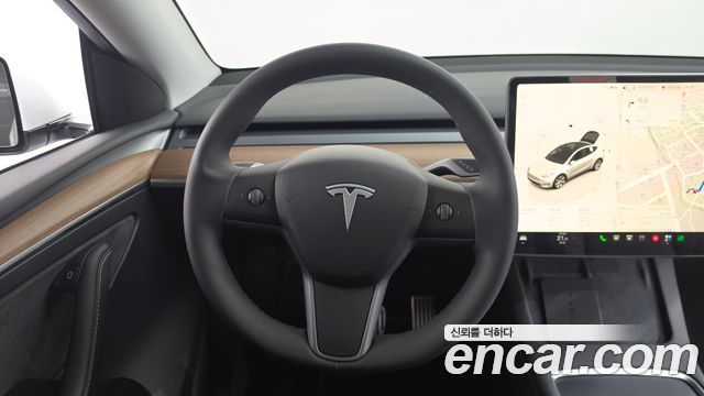 Tesla Model Y 2024 — photo 18