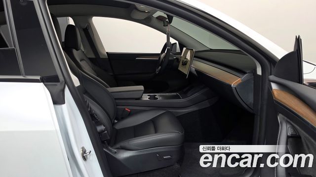 Tesla Model Y 2024 — photo 16
