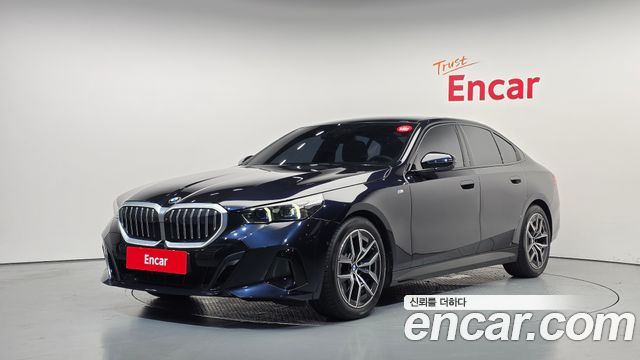 BMW 5-Series 2024 — photo 1