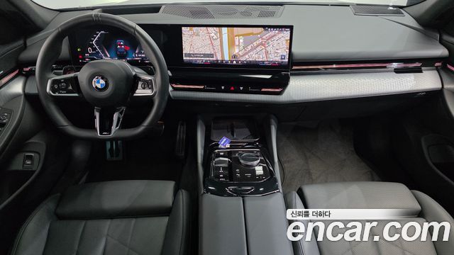 BMW 5-Series 2024 — photo 10