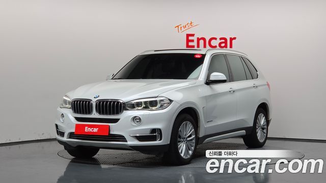 BMW X5 2014 — photo 1
