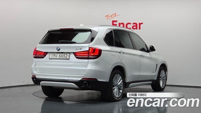BMW X5 2014 — photo 2