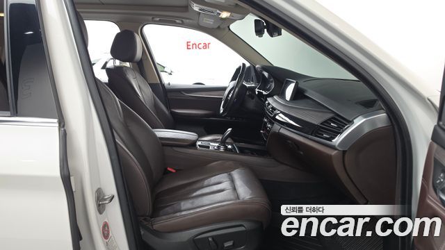 BMW X5 2014 — photo 11