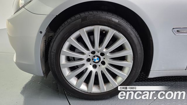 BMW 7-Series 2011 — photo 5