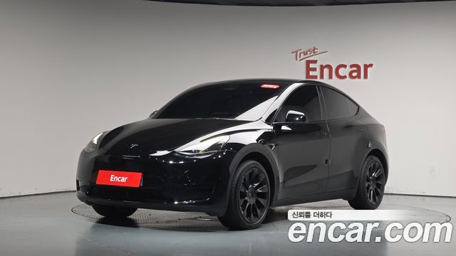 Tesla Model Y 2024 — photo 37